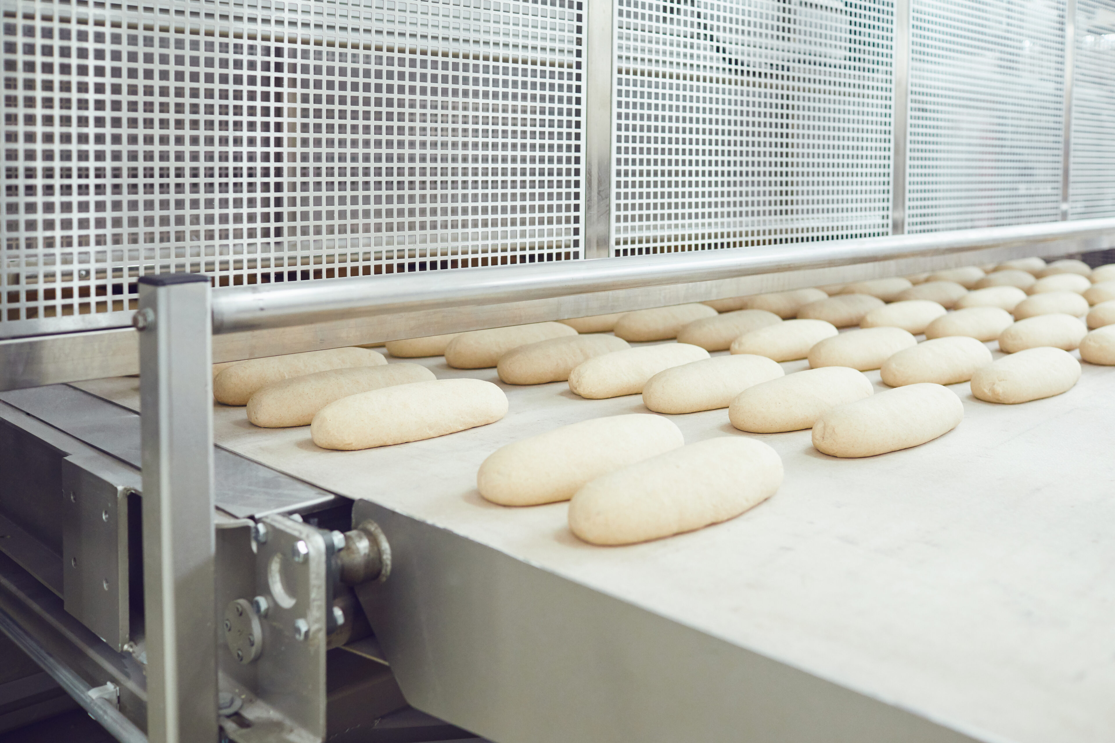Raw,Bread,Is,Making,On,The,Automatic,Equipment,Line,In